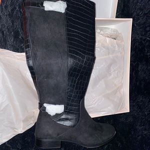 Brand new boots in black leather and suede